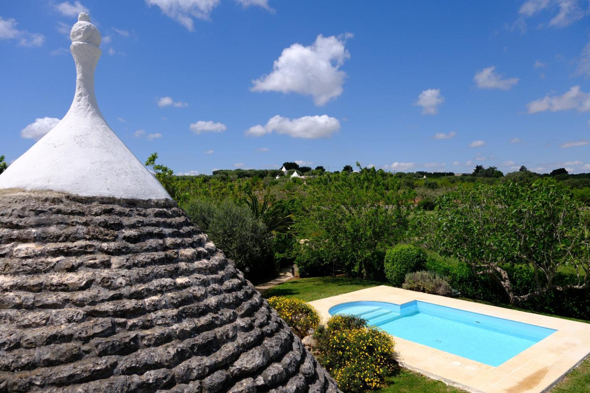 Terra Sessana Ville E Trullo Con Piscina Privata オストゥーニ エクステリア 写真