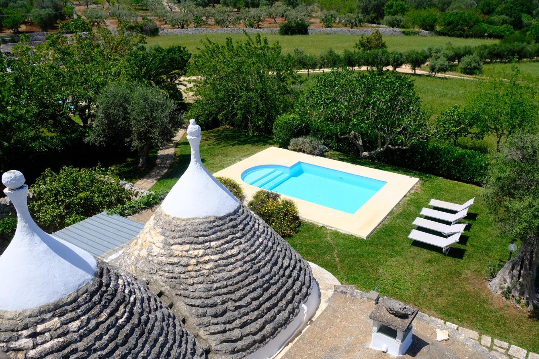 Terra Sessana Ville E Trullo Con Piscina Privata オストゥーニ エクステリア 写真