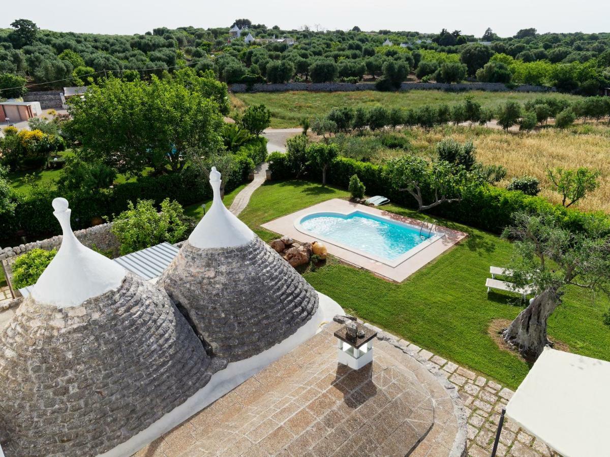 Terra Sessana Ville E Trullo Con Piscina Privata オストゥーニ エクステリア 写真